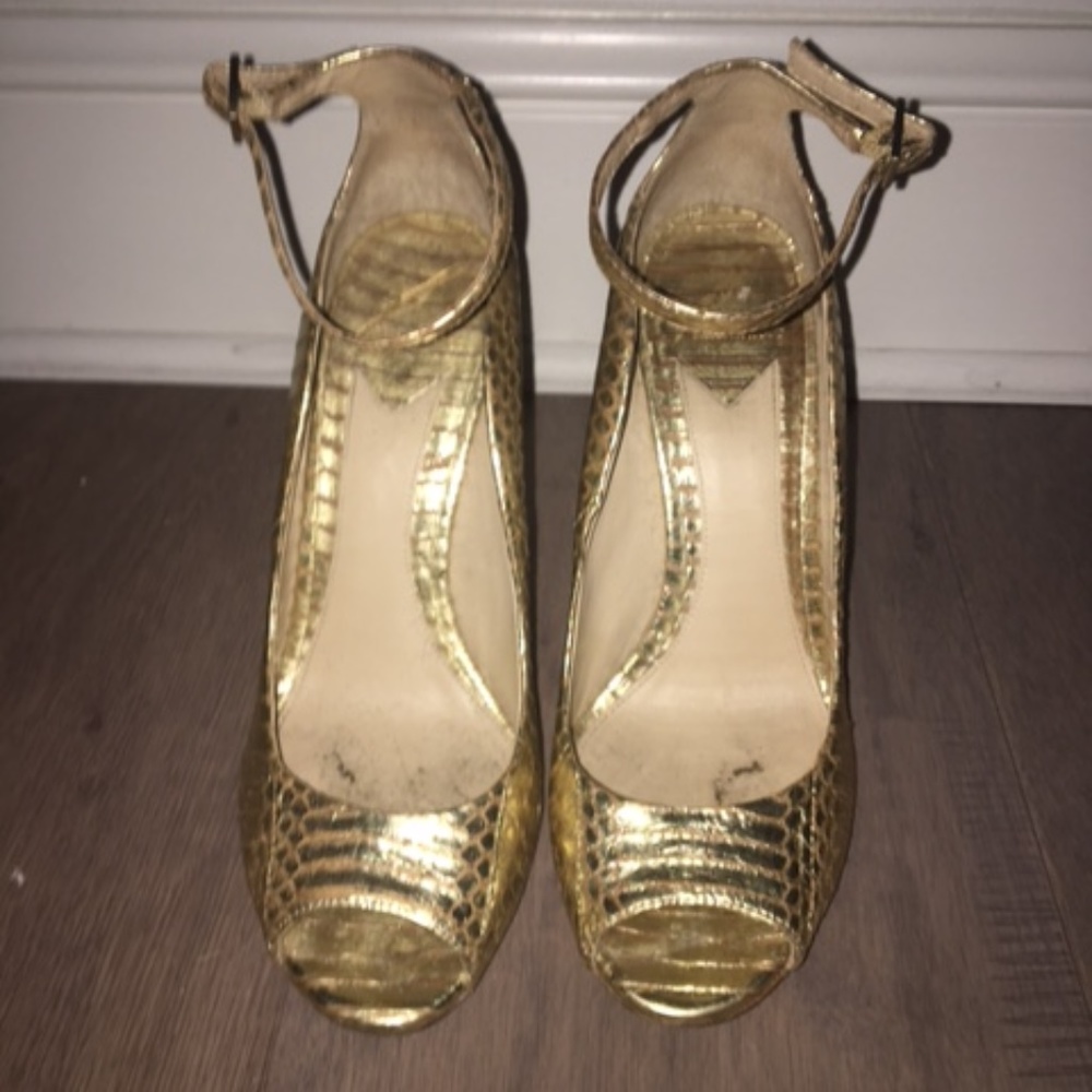 Giuseppe Zanotti Gold strappy high heel sandle.